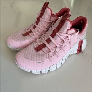 Women’s Nike size 8.5 pink shoes. Only worn a couple of times!